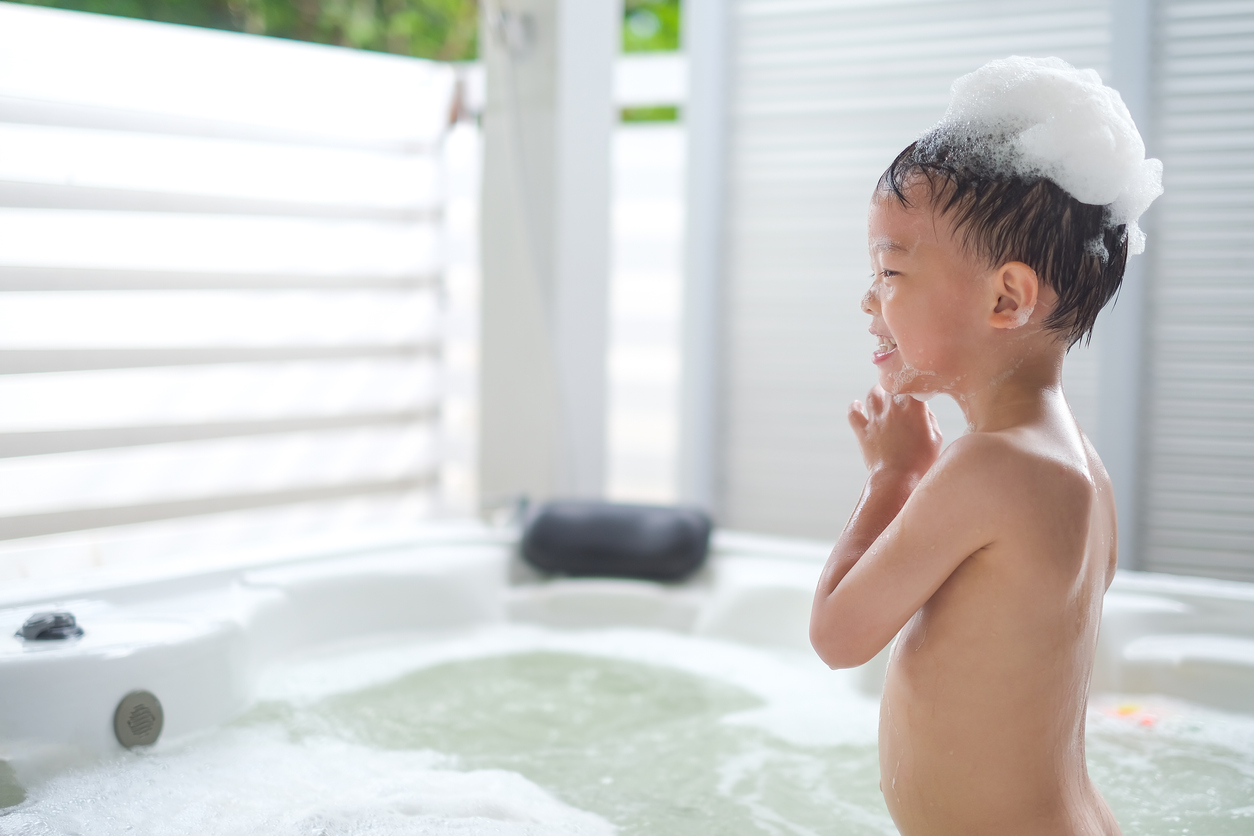 Kid in hot tub