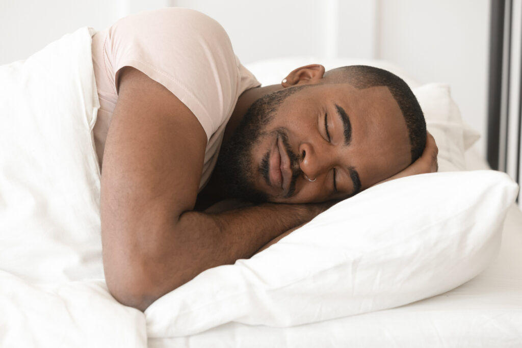 Man Sleeping in a bed